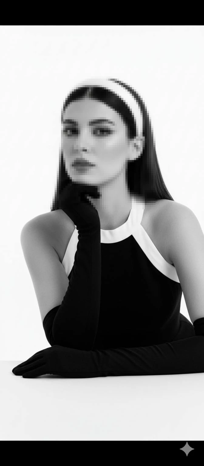 Elegant woman in black and white outfit with gloves in minimalist studio style