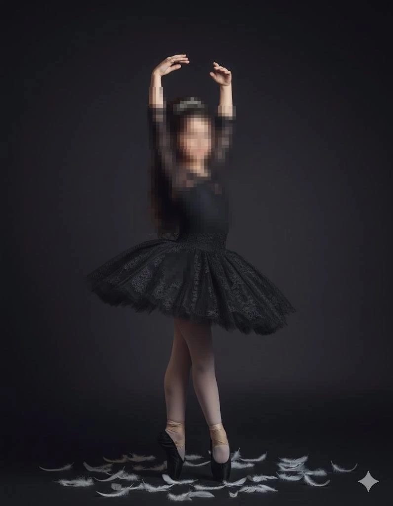 Little girl in elegant black ballet dress dancing gracefully with white feathers
