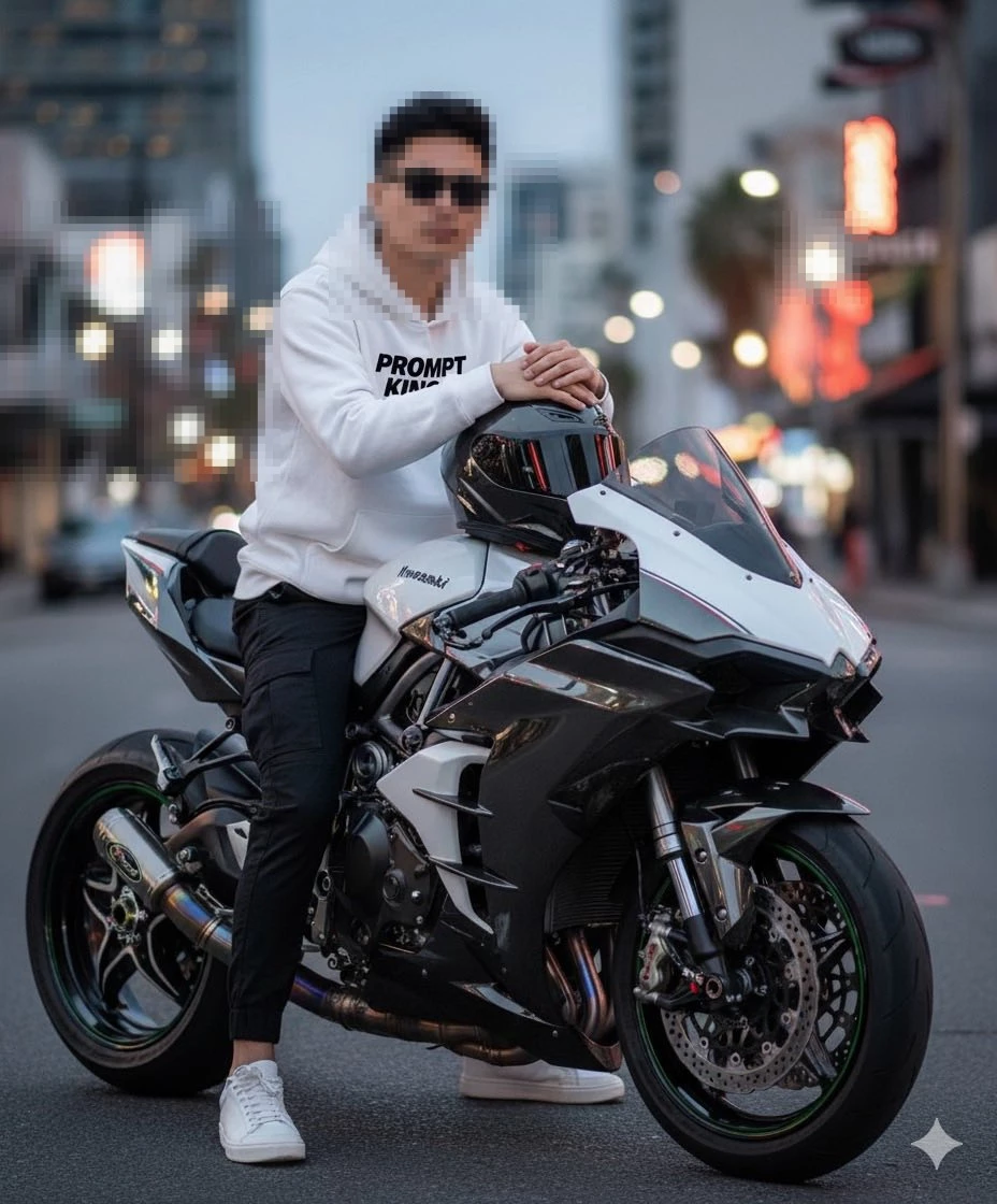 Man in white hoodie sitting on black and white Kawasaki motorcycle in city street