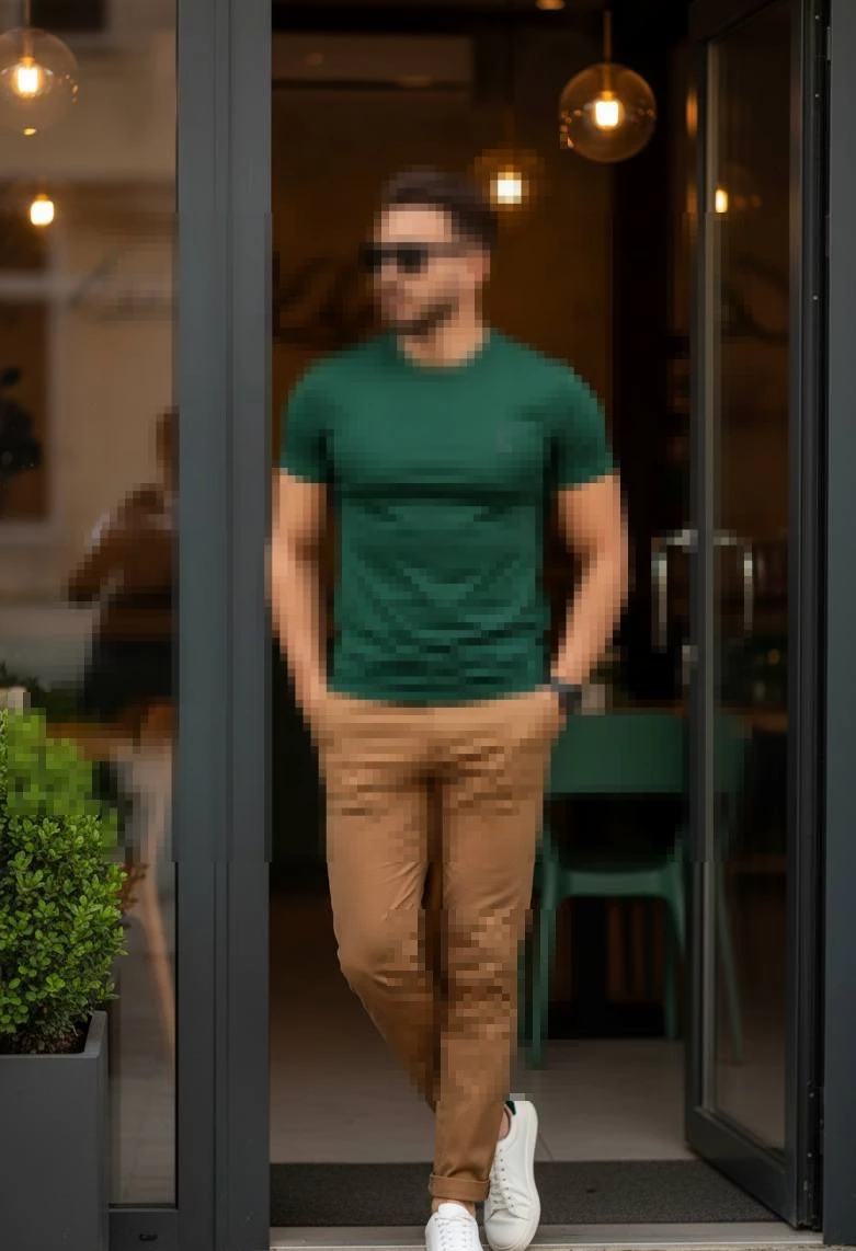 Man Standing Beside Black Motorcycle in Stylish Underground Parking Garage