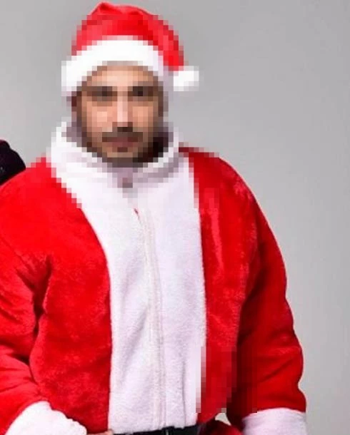 Man Wearing Santa Costume in Festive Studio Holiday Portrait