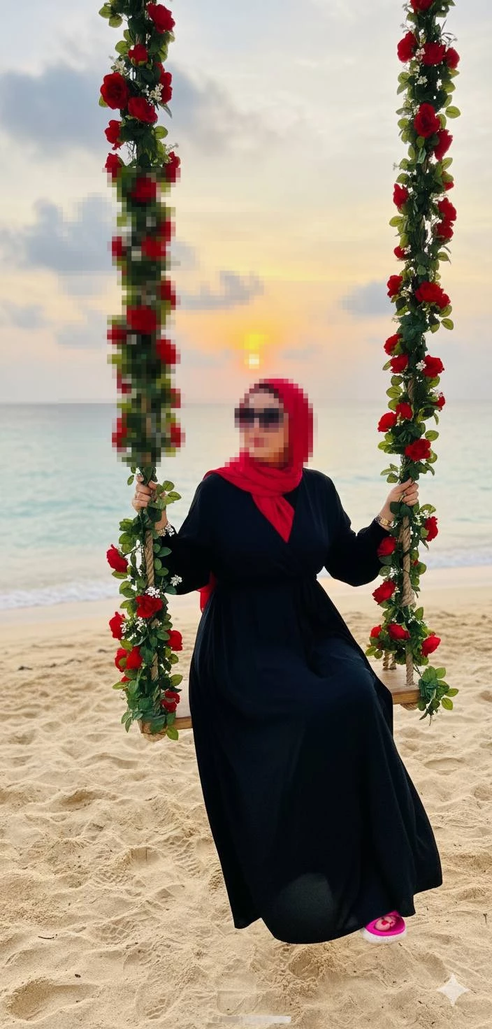 Woman in Red Headscarf on Floral Swing at Sunset Beach