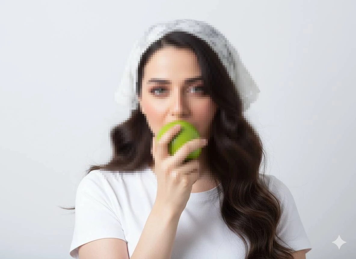 Woman in White Headscarf Holding Green Apple Against Minimalist Background