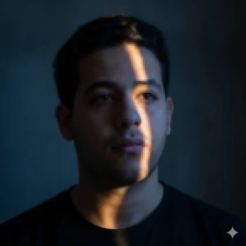Dramatic Portrait of a Man with Sunlight Beam Across His Face