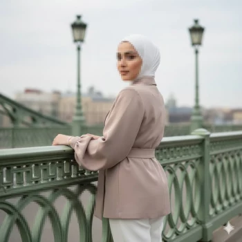 Elegant Portrait of a Woman on a Bridge in Soft Neutral Tones