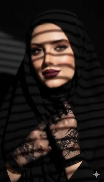 Elegant Woman in Black Hijab with Lace Gloves under Dramatic Lighting