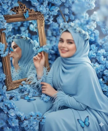 Elegant Woman in Blue Hijab Surrounded by Flowers and Butterflies