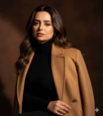 Elegant Woman in Camel Coat and Black Turtleneck with Classic Style