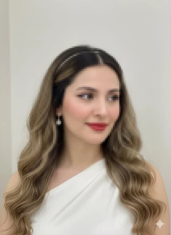 Elegant woman in white dress with wavy hair and classic red lipstick