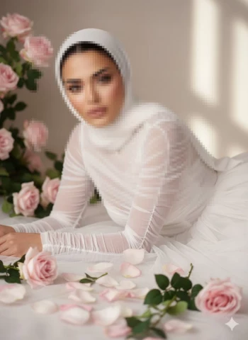 Elegant Woman in White Hijab Posing Among Pink Roses and Soft Natural Light