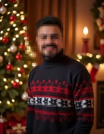 Festive Christmas Portrait of a Man Smiling in a Holiday Sweater