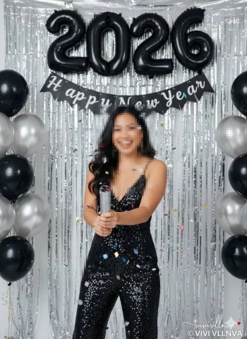 Happy New Year 2026 Celebration with Confetti and Elegant Black Outfit