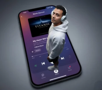 Man Listening to Music While Standing on Giant Smartphone Screen