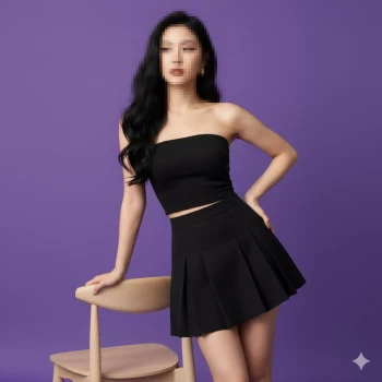 Stylish woman in black outfit posing confidently against purple background