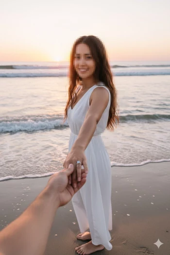 Woman Holding Hand on Beach at Sunset in White Dress