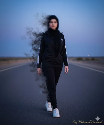 Woman in black hijab and tracksuit walking on road with smoky visual effect