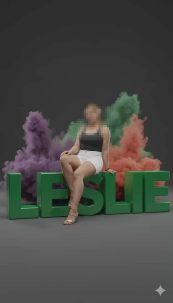 Woman sitting on green 3D letters with colorful smoke background in studio