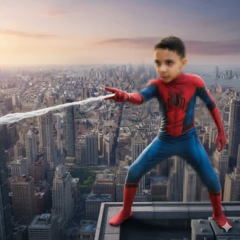 Young Boy Dressed as Spider-Man Standing on City Rooftop at Sunset